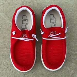 Gently used red and white Hey Dude’s Kids 11